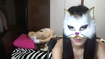 Sexy Asian masked as a cat teasing on webcamera